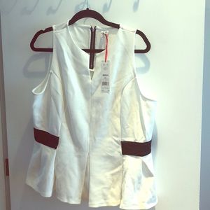 Black and white peplum sleeveless top